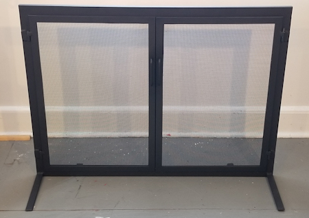 All black finish free standing mesh door screen unit
